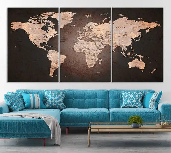 A World Map Canvas Print with a vintage design enhances the dark wall. This three-panel artwork is crafted on museum-quality canvases, gallery wrapped, and features a UV-protective coating for enduring brilliance.