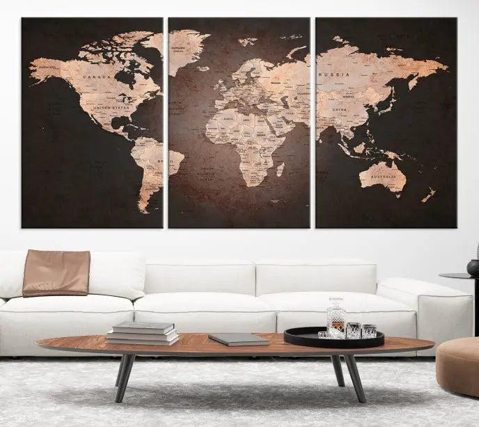 A World Map Canvas Print with a vintage design enhances the dark wall. This three-panel artwork is crafted on museum-quality canvases, gallery wrapped, and features a UV-protective coating for enduring brilliance.