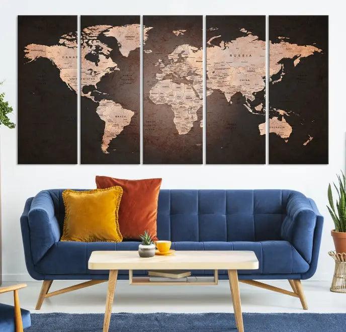 A World Map Canvas Print with a vintage design enhances the dark wall. This three-panel artwork is crafted on museum-quality canvases, gallery wrapped, and features a UV-protective coating for enduring brilliance.