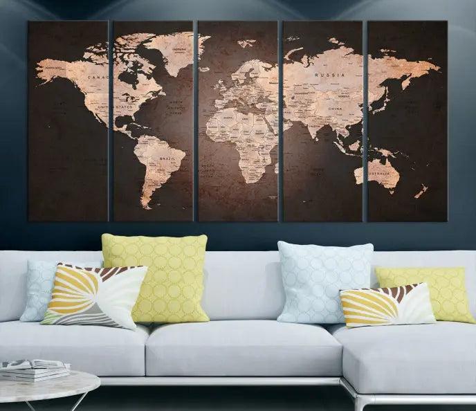 A World Map Canvas Print with a vintage design enhances the dark wall. This three-panel artwork is crafted on museum-quality canvases, gallery wrapped, and features a UV-protective coating for enduring brilliance.