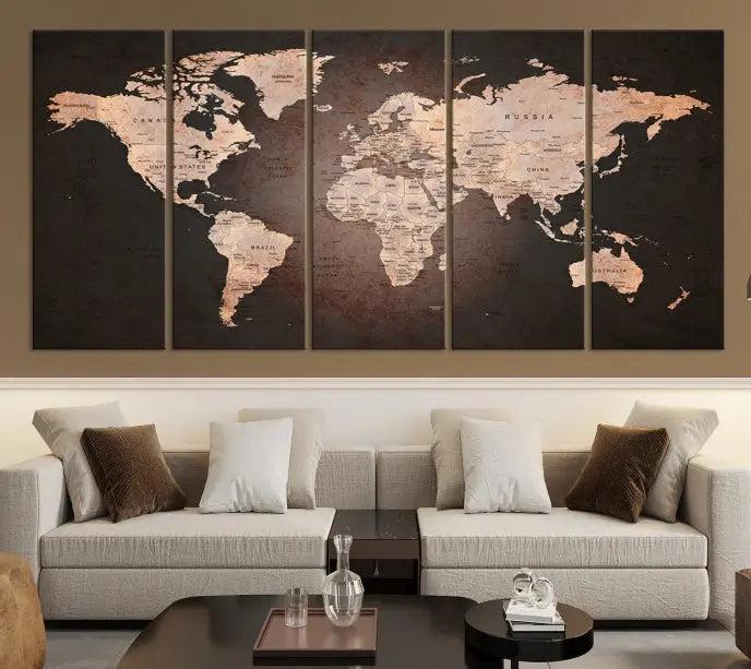 A World Map Canvas Print with a vintage design enhances the dark wall. This three-panel artwork is crafted on museum-quality canvases, gallery wrapped, and features a UV-protective coating for enduring brilliance.