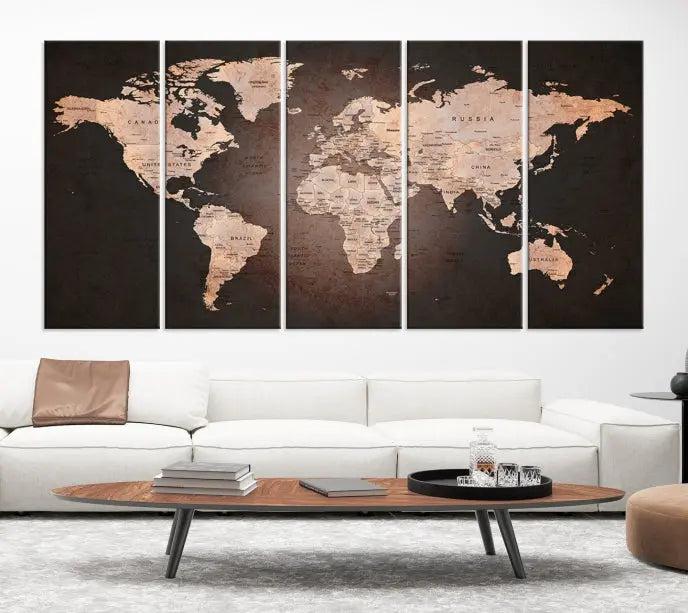 A World Map Canvas Print with a vintage design enhances the dark wall. This three-panel artwork is crafted on museum-quality canvases, gallery wrapped, and features a UV-protective coating for enduring brilliance.