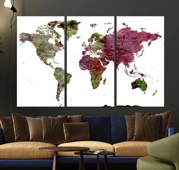 The stylish living room showcases a World Map Canvas Print, a three-panel art piece. Each canvas is gallery wrapped and finished with a UV-protective coating to maintain its vibrant appeal.