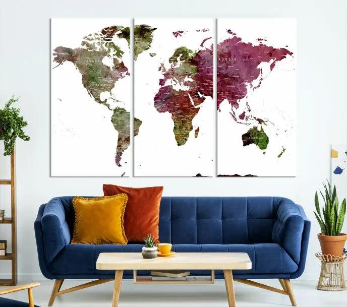 The stylish living room showcases a World Map Canvas Print, a three-panel art piece. Each canvas is gallery wrapped and finished with a UV-protective coating to maintain its vibrant appeal.