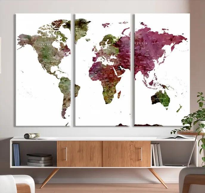 The stylish living room showcases a World Map Canvas Print, a three-panel art piece. Each canvas is gallery wrapped and finished with a UV-protective coating to maintain its vibrant appeal.