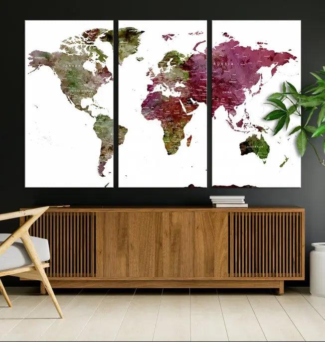 The stylish living room showcases a World Map Canvas Print, a three-panel art piece. Each canvas is gallery wrapped and finished with a UV-protective coating to maintain its vibrant appeal.