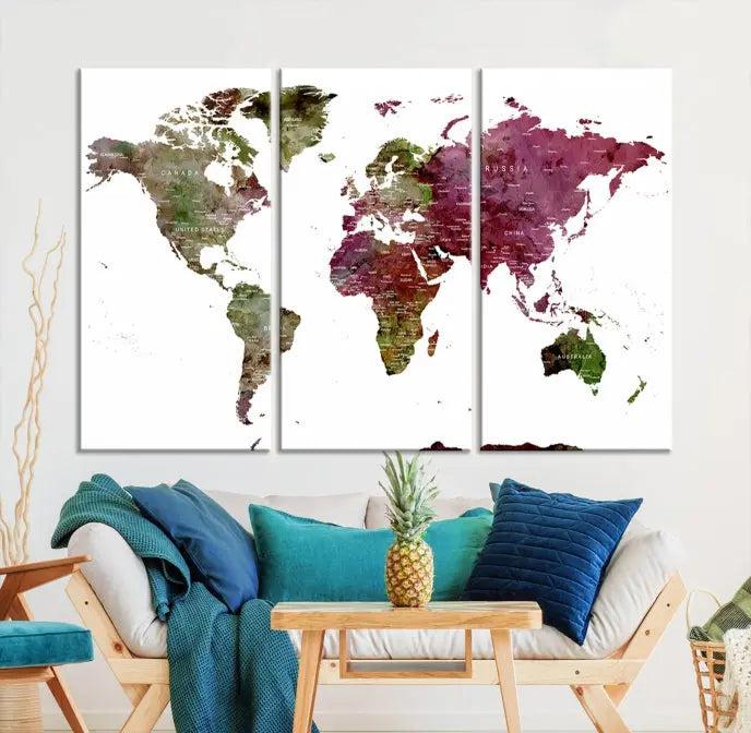 The stylish living room showcases a World Map Canvas Print, a three-panel art piece. Each canvas is gallery wrapped and finished with a UV-protective coating to maintain its vibrant appeal.