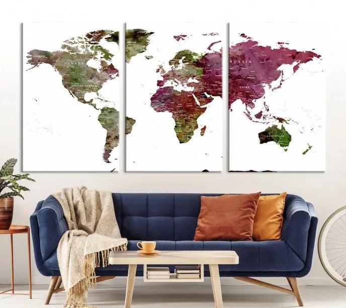 The stylish living room showcases a World Map Canvas Print, a three-panel art piece. Each canvas is gallery wrapped and finished with a UV-protective coating to maintain its vibrant appeal.