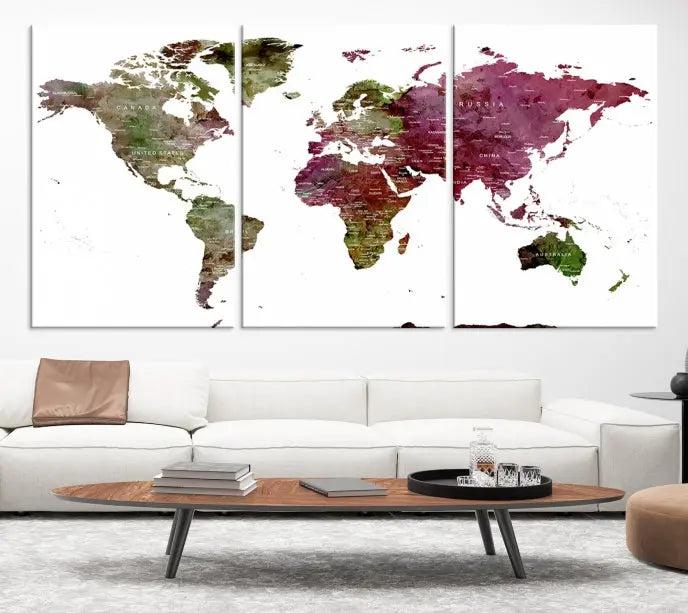 The stylish living room showcases a World Map Canvas Print, a three-panel art piece. Each canvas is gallery wrapped and finished with a UV-protective coating to maintain its vibrant appeal.