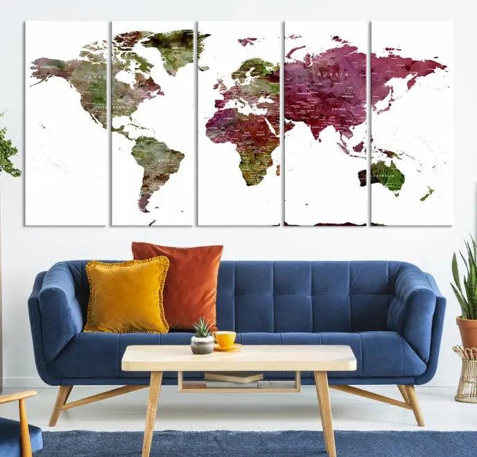 The stylish living room showcases a World Map Canvas Print, a three-panel art piece. Each canvas is gallery wrapped and finished with a UV-protective coating to maintain its vibrant appeal.