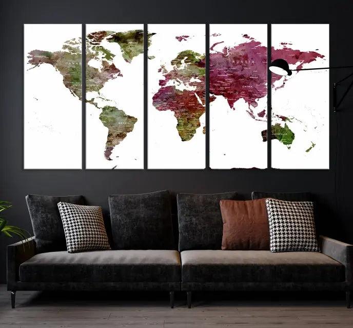 The stylish living room showcases a World Map Canvas Print, a three-panel art piece. Each canvas is gallery wrapped and finished with a UV-protective coating to maintain its vibrant appeal.