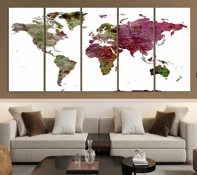 The stylish living room showcases a World Map Canvas Print, a three-panel art piece. Each canvas is gallery wrapped and finished with a UV-protective coating to maintain its vibrant appeal.