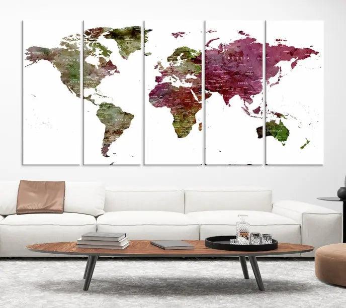 The stylish living room showcases a World Map Canvas Print, a three-panel art piece. Each canvas is gallery wrapped and finished with a UV-protective coating to maintain its vibrant appeal.