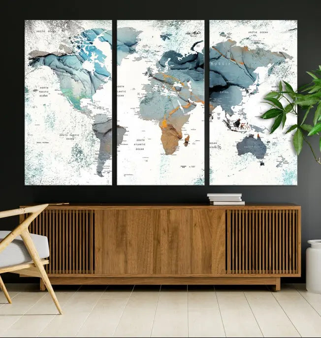 A museum-quality, five-panel World Map Canvas Print adorns the dark wall. Its UV-protective canvas ensures lasting vibrancy.