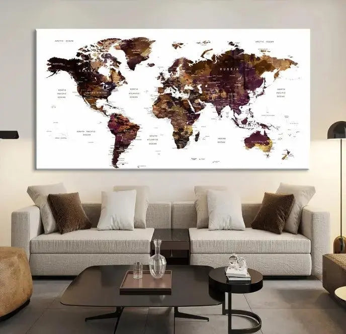 A three-panel World Map Painting Wall Art Canvas Print, crafted on museum-quality canvas with a UV-protective coating, is displayed in this modern living room. It's ready to hang, adding a sophisticated touch to the stylish space.