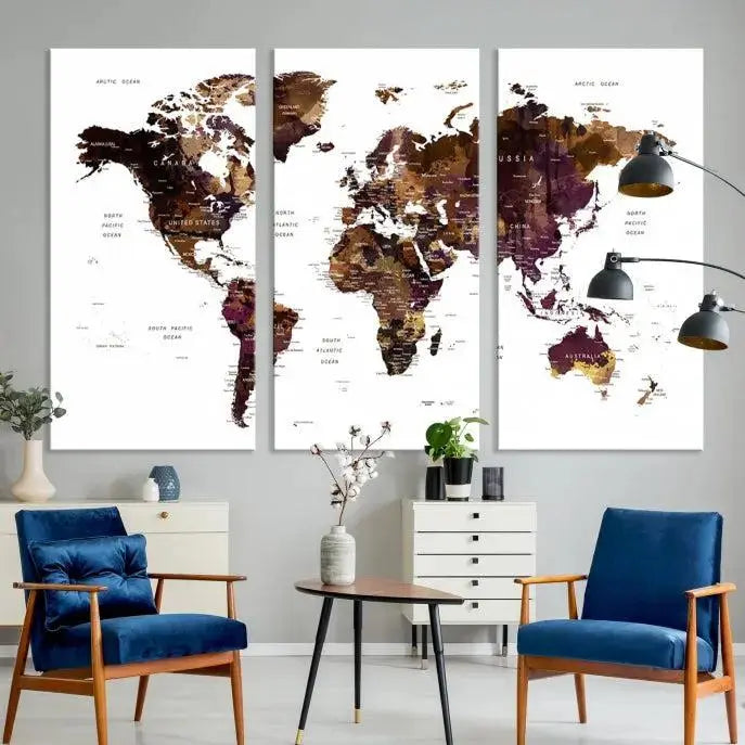 A three-panel World Map Painting Wall Art Canvas Print, crafted on museum-quality canvas with a UV-protective coating, is displayed in this modern living room. It's ready to hang, adding a sophisticated touch to the stylish space.