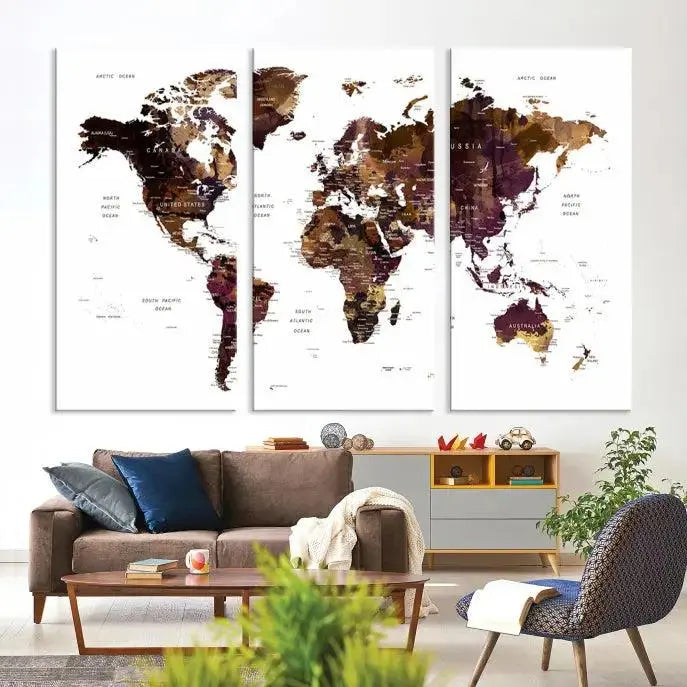 A three-panel World Map Painting Wall Art Canvas Print, crafted on museum-quality canvas with a UV-protective coating, is displayed in this modern living room. It's ready to hang, adding a sophisticated touch to the stylish space.