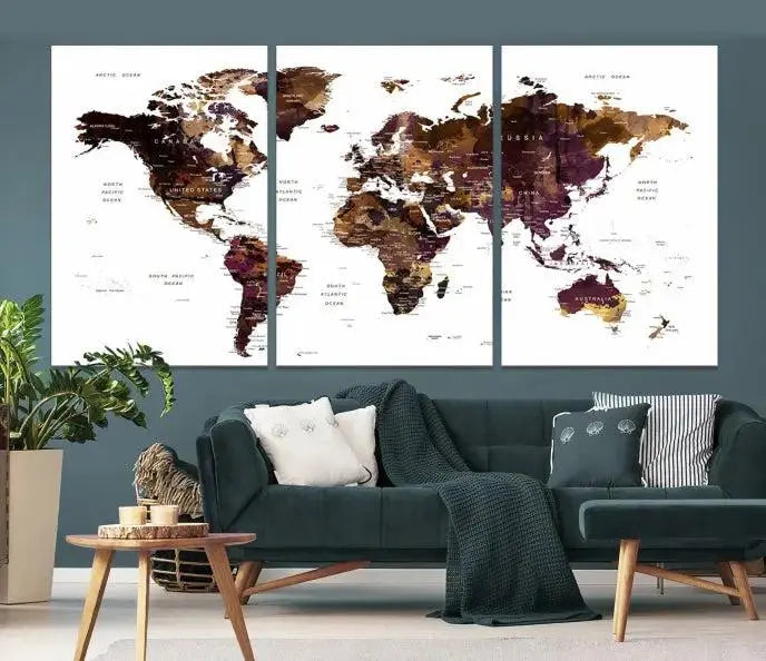 A three-panel World Map Painting Wall Art Canvas Print, crafted on museum-quality canvas with a UV-protective coating, is displayed in this modern living room. It's ready to hang, adding a sophisticated touch to the stylish space.