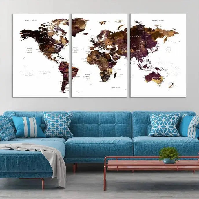 A three-panel World Map Painting Wall Art Canvas Print, crafted on museum-quality canvas with a UV-protective coating, is displayed in this modern living room. It's ready to hang, adding a sophisticated touch to the stylish space.