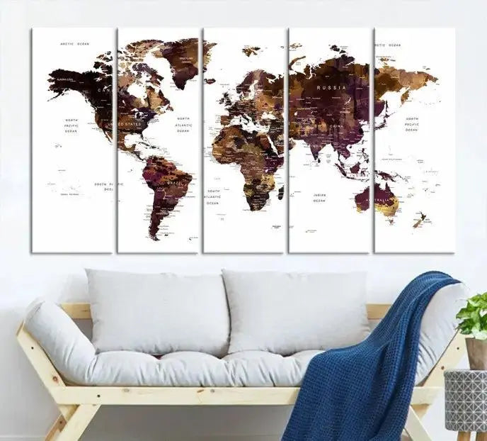 A three-panel World Map Painting Wall Art Canvas Print, crafted on museum-quality canvas with a UV-protective coating, is displayed in this modern living room. It's ready to hang, adding a sophisticated touch to the stylish space.