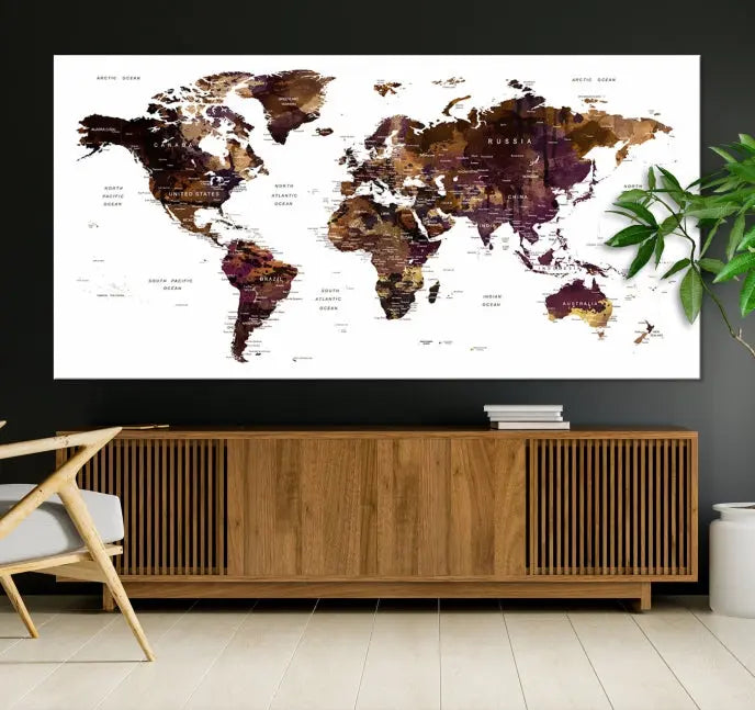 A three-panel World Map Painting Wall Art Canvas Print, crafted on museum-quality canvas with a UV-protective coating, is displayed in this modern living room. It's ready to hang, adding a sophisticated touch to the stylish space.