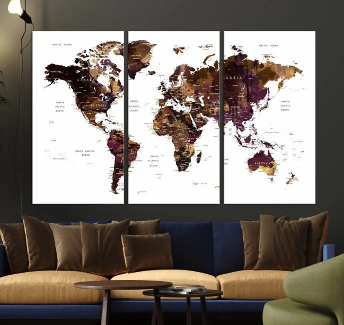 A three-panel World Map Painting Wall Art Canvas Print, crafted on museum-quality canvas with a UV-protective coating, is displayed in this modern living room. It's ready to hang, adding a sophisticated touch to the stylish space.