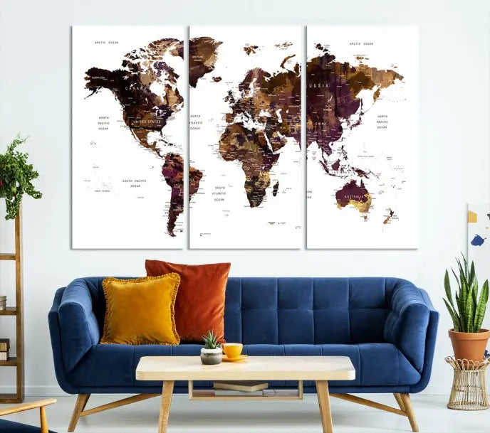 A three-panel World Map Painting Wall Art Canvas Print, crafted on museum-quality canvas with a UV-protective coating, is displayed in this modern living room. It's ready to hang, adding a sophisticated touch to the stylish space.