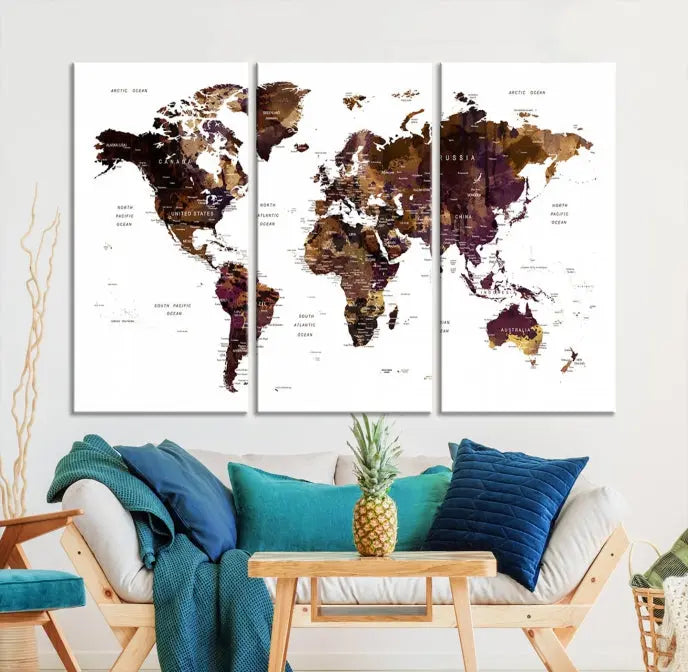 A three-panel World Map Painting Wall Art Canvas Print, crafted on museum-quality canvas with a UV-protective coating, is displayed in this modern living room. It's ready to hang, adding a sophisticated touch to the stylish space.