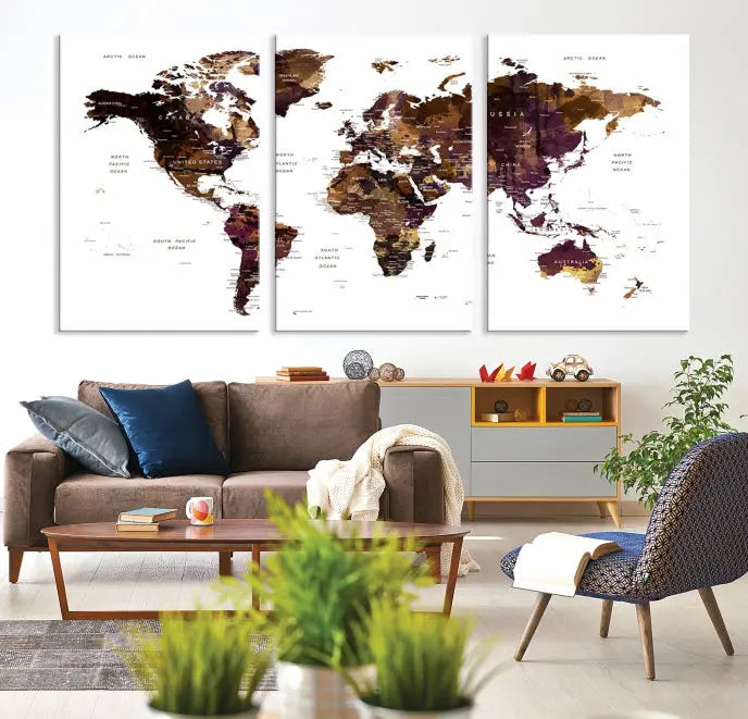 A three-panel World Map Painting Wall Art Canvas Print, crafted on museum-quality canvas with a UV-protective coating, is displayed in this modern living room. It's ready to hang, adding a sophisticated touch to the stylish space.