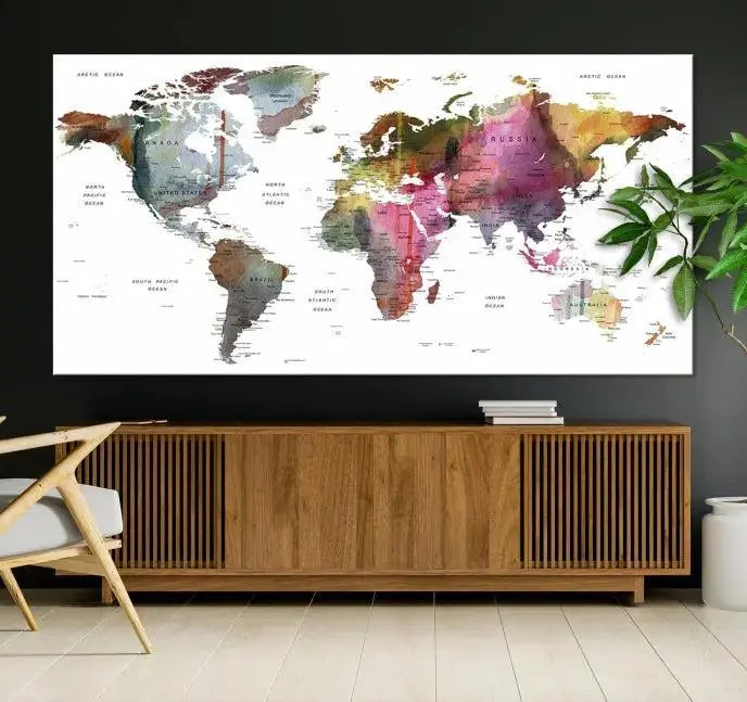 The "World Map Push Pin Travel Lover Wall Art Canvas Print" embellishes the space with its museum-quality canvas and UV-protective coating, bringing sophistication to your decor. It's ready to hang right away.