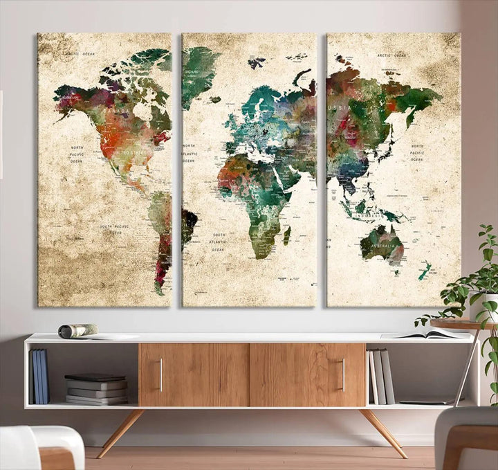 The "World Map Wall Art Print - Grunge Stained Background Large World Map Wall Art Canvas Print" is elegantly displayed on a wooden wall, serving as an ideal focal point in your home decor.