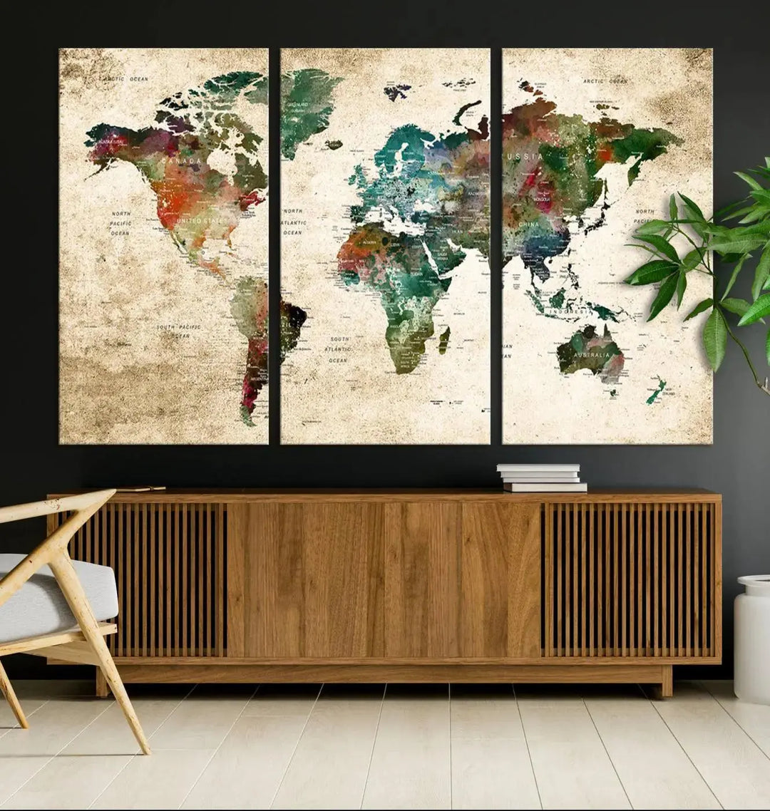 The "World Map Wall Art Print - Grunge Stained Background Large World Map Wall Art Canvas Print" is elegantly displayed on a wooden wall, serving as an ideal focal point in your home decor.