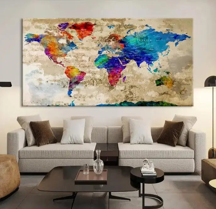 A museum-quality World Map Wall Art Canvas Print with vibrant colors and UV protection coating hangs prominently in a modern living room.