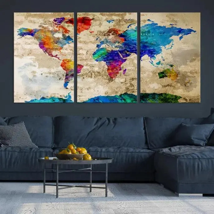 A museum-quality World Map Wall Art Canvas Print with vibrant colors and UV protection coating hangs prominently in a modern living room.