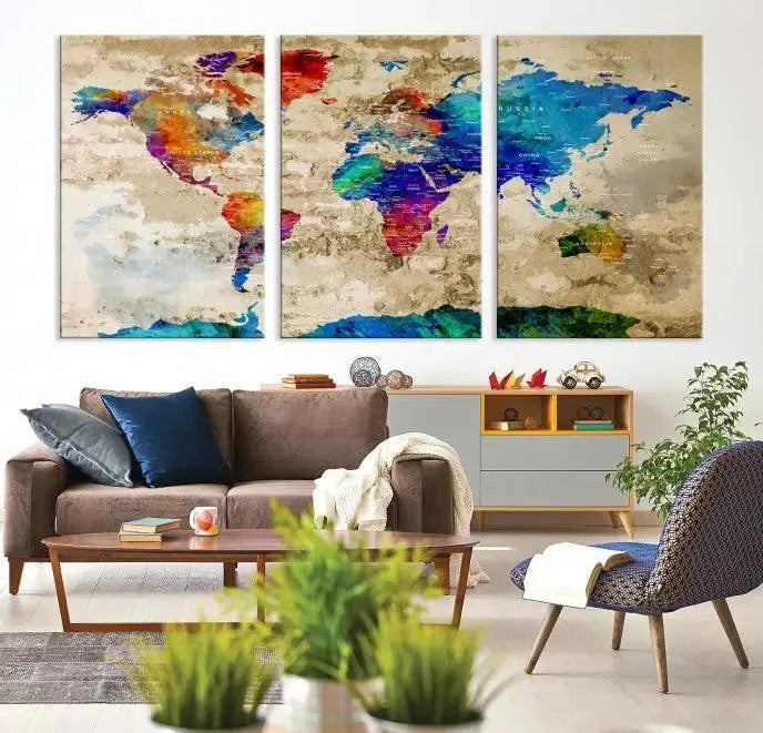 A museum-quality World Map Wall Art Canvas Print with vibrant colors and UV protection coating hangs prominently in a modern living room.