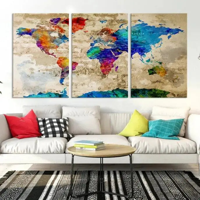 A museum-quality World Map Wall Art Canvas Print with vibrant colors and UV protection coating hangs prominently in a modern living room.