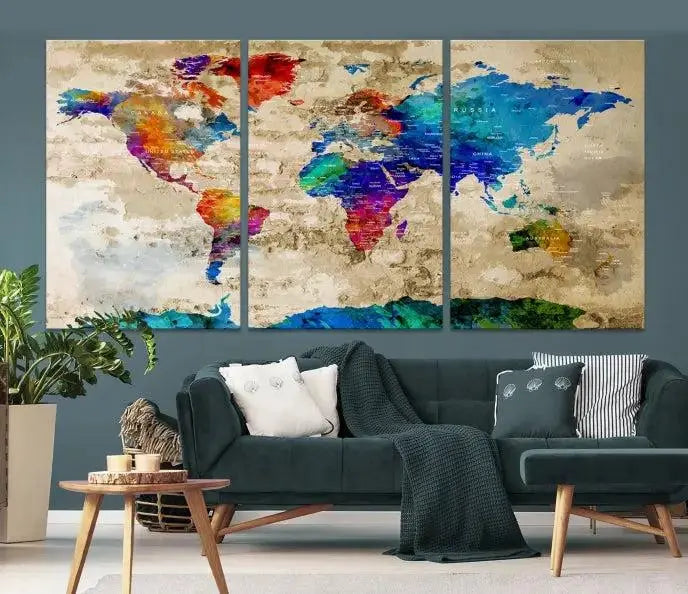 A museum-quality World Map Wall Art Canvas Print with vibrant colors and UV protection coating hangs prominently in a modern living room.