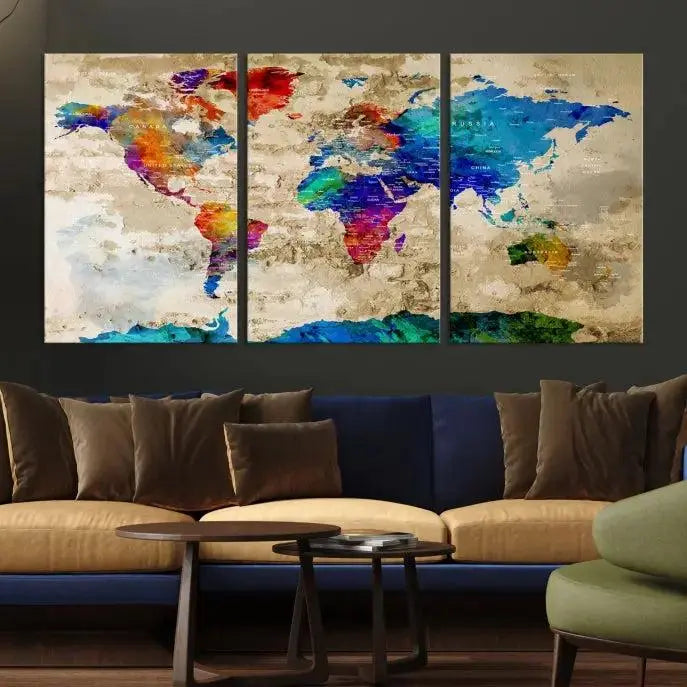 A museum-quality World Map Wall Art Canvas Print with vibrant colors and UV protection coating hangs prominently in a modern living room.