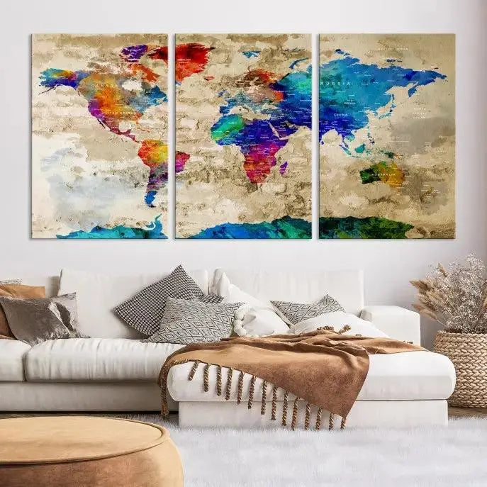 A museum-quality World Map Wall Art Canvas Print with vibrant colors and UV protection coating hangs prominently in a modern living room.