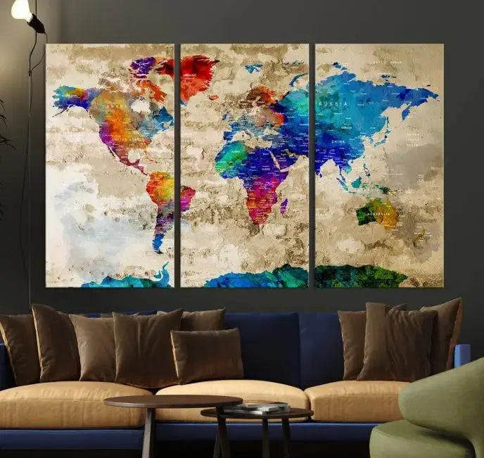 A museum-quality World Map Wall Art Canvas Print with vibrant colors and UV protection coating hangs prominently in a modern living room.