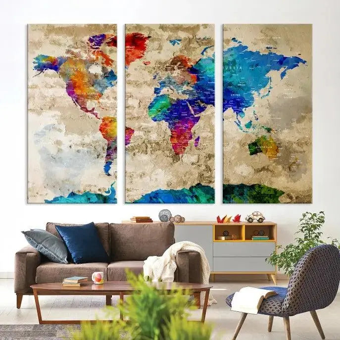 A museum-quality World Map Wall Art Canvas Print with vibrant colors and UV protection coating hangs prominently in a modern living room.