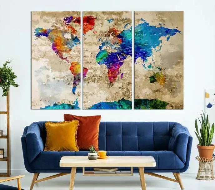 A museum-quality World Map Wall Art Canvas Print with vibrant colors and UV protection coating hangs prominently in a modern living room.