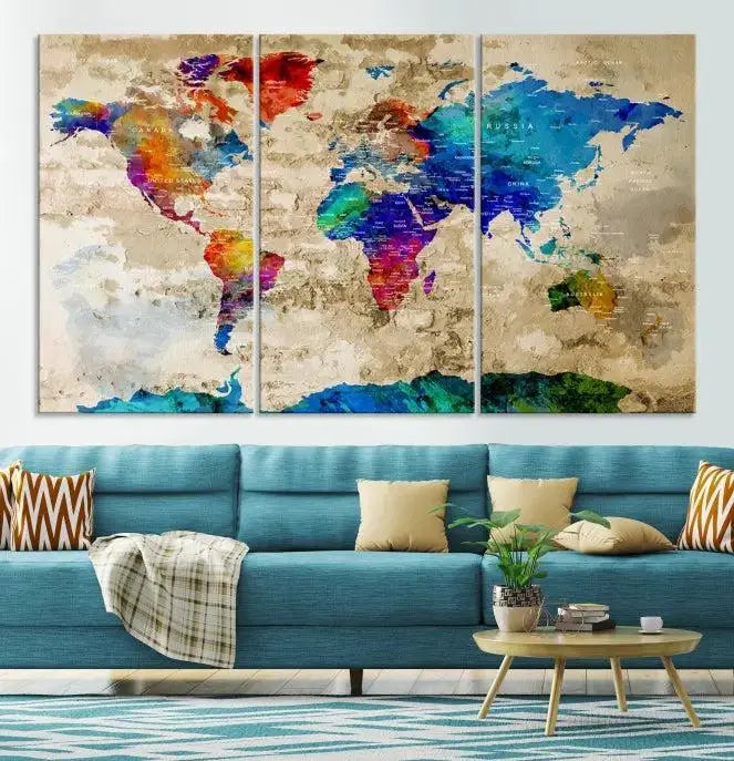 A museum-quality World Map Wall Art Canvas Print with vibrant colors and UV protection coating hangs prominently in a modern living room.