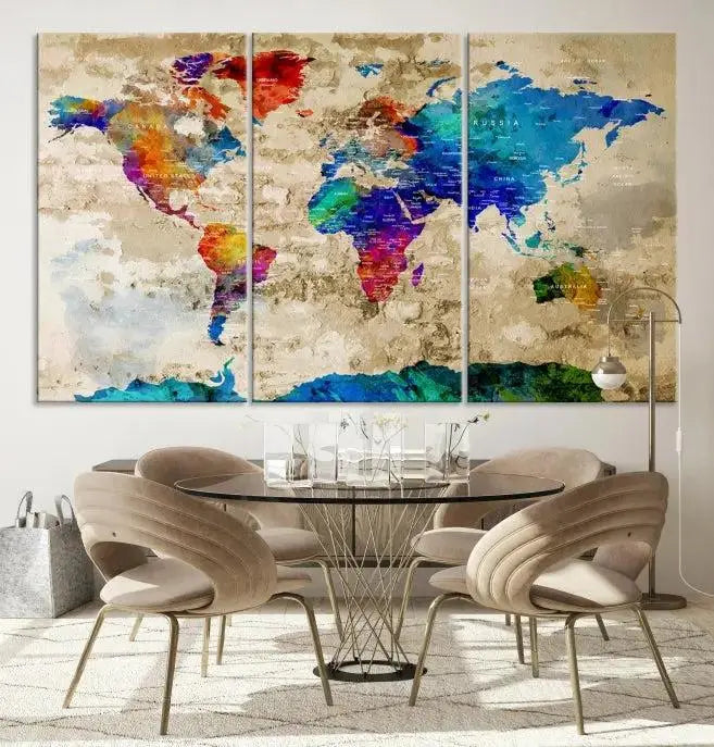 A museum-quality World Map Wall Art Canvas Print with vibrant colors and UV protection coating hangs prominently in a modern living room.