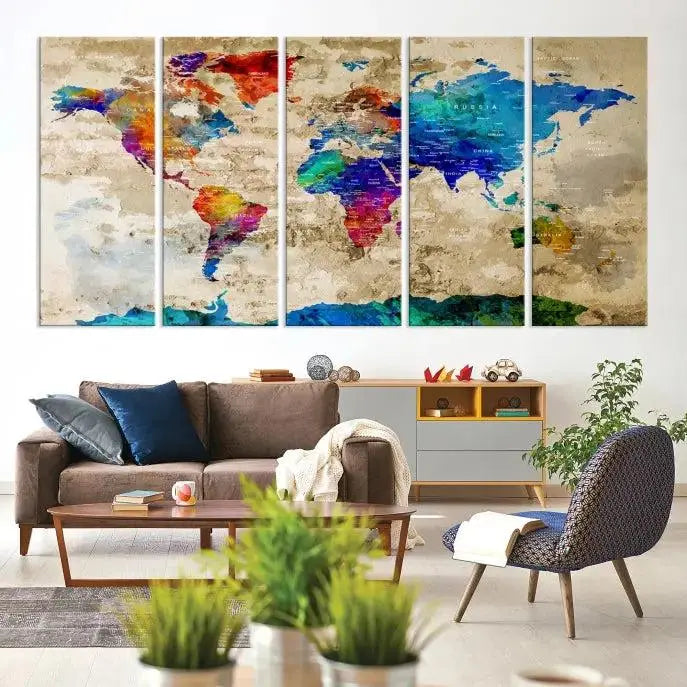 A museum-quality World Map Wall Art Canvas Print with vibrant colors and UV protection coating hangs prominently in a modern living room.