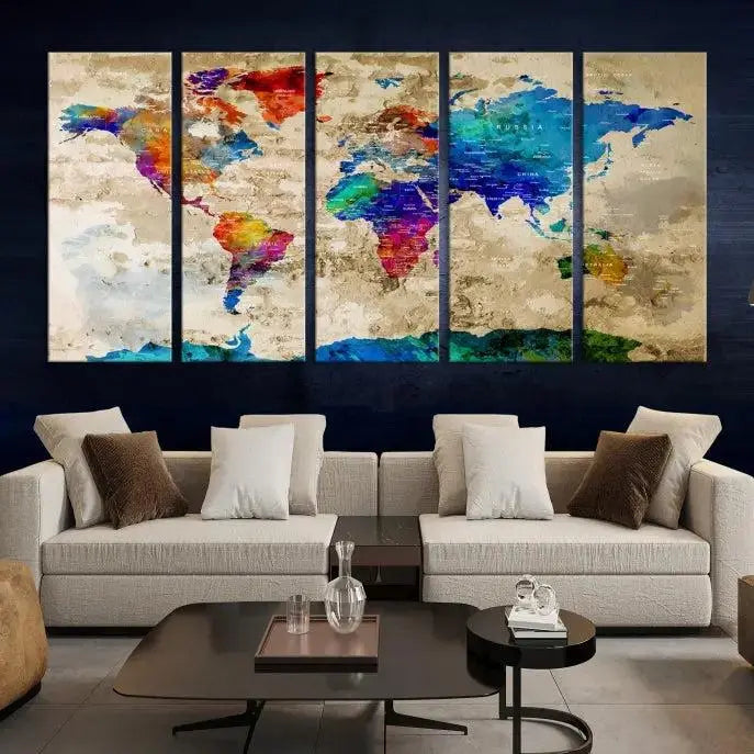 A museum-quality World Map Wall Art Canvas Print with vibrant colors and UV protection coating hangs prominently in a modern living room.