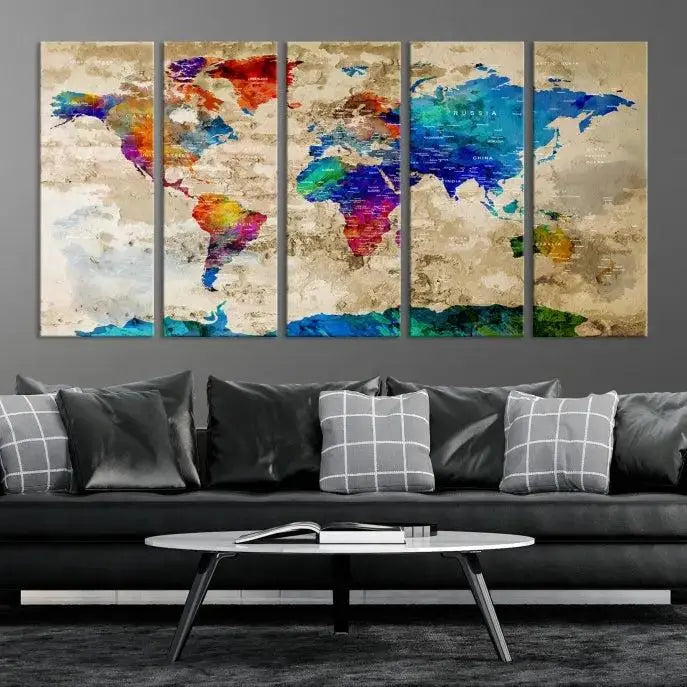 A museum-quality World Map Wall Art Canvas Print with vibrant colors and UV protection coating hangs prominently in a modern living room.