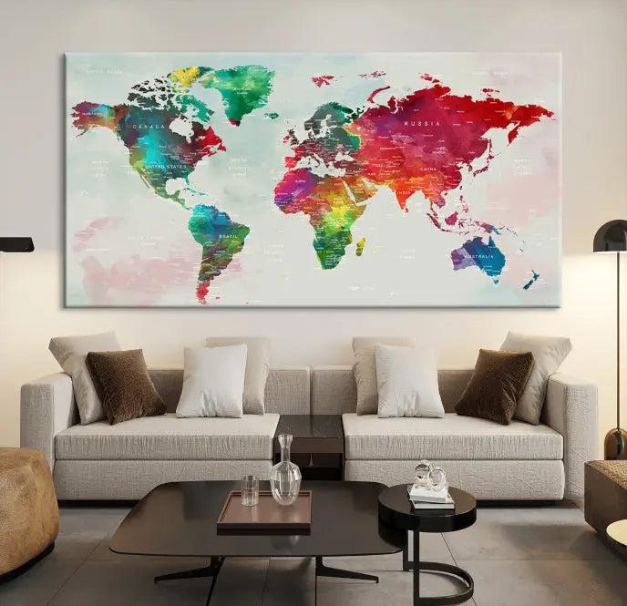 The World Map Wall Art Canvas Print features colorful watercolor continents across three panels, crafted on museum-quality canvas and ready to hang.