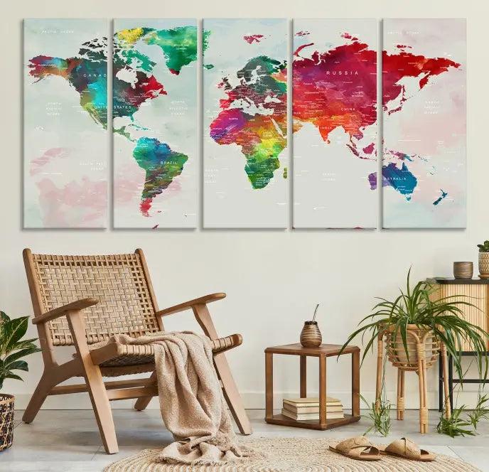 The World Map Wall Art Canvas Print features colorful watercolor continents across three panels, crafted on museum-quality canvas and ready to hang.