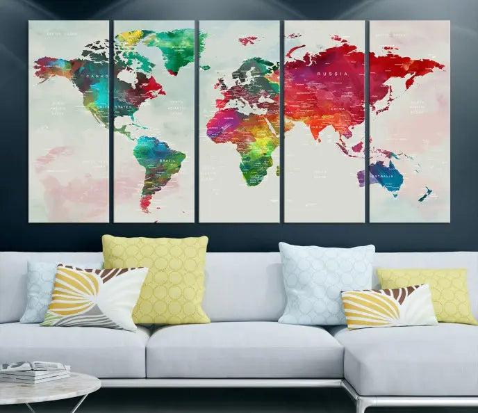 The World Map Wall Art Canvas Print features colorful watercolor continents across three panels, crafted on museum-quality canvas and ready to hang.